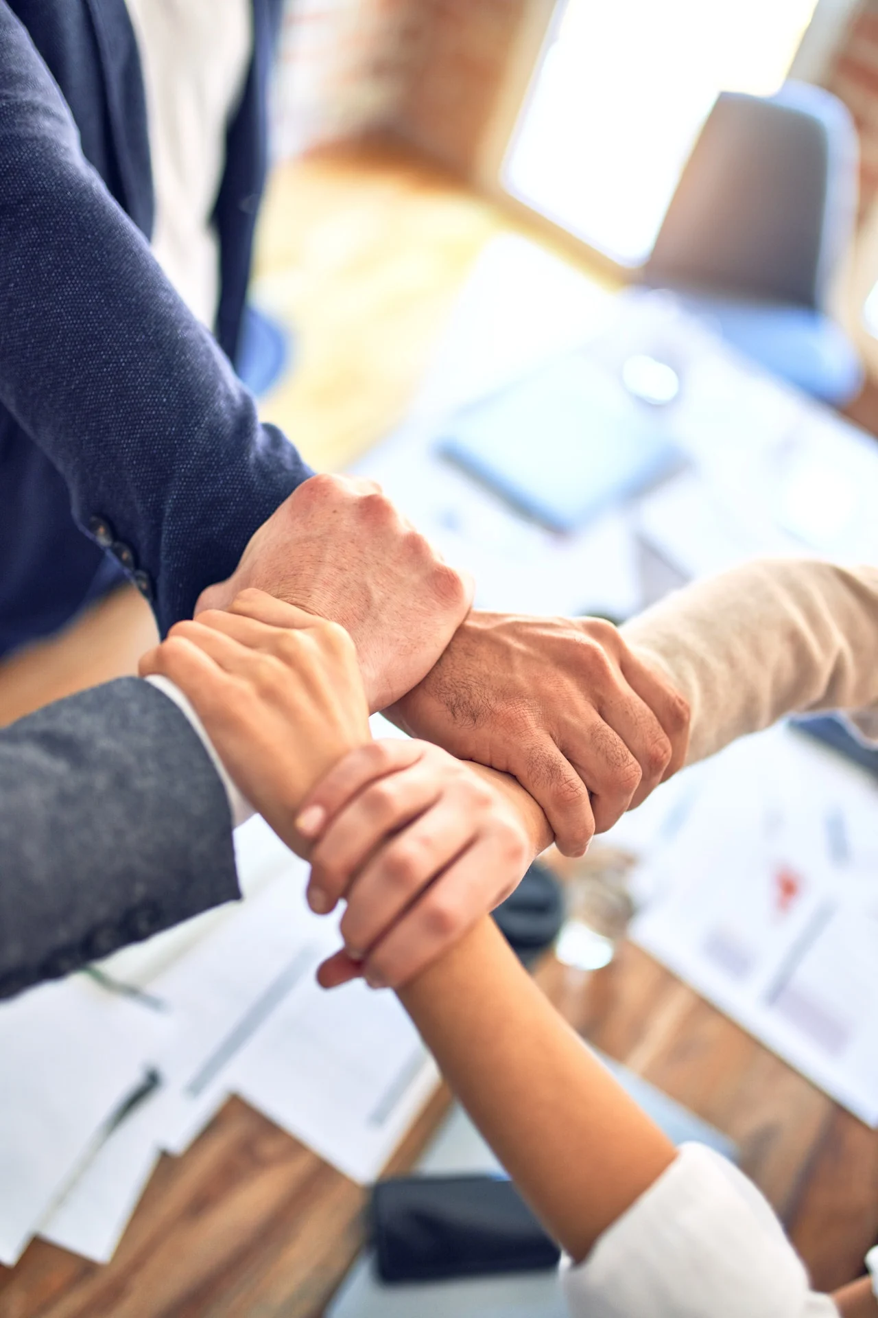 Business hands overlapping